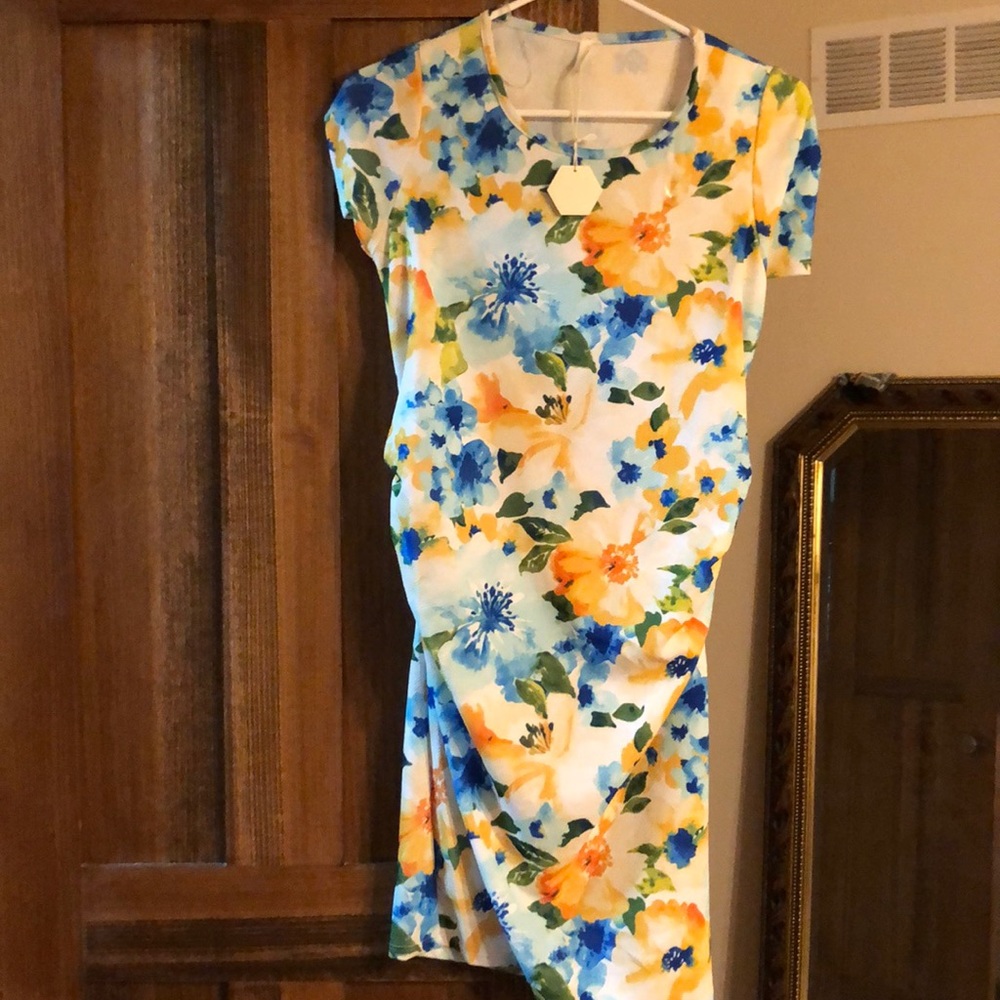 Floral maternity dress. Never worn, new with tags